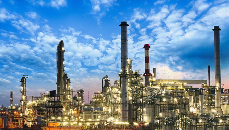 dynamic image of industrial factory against a sunset